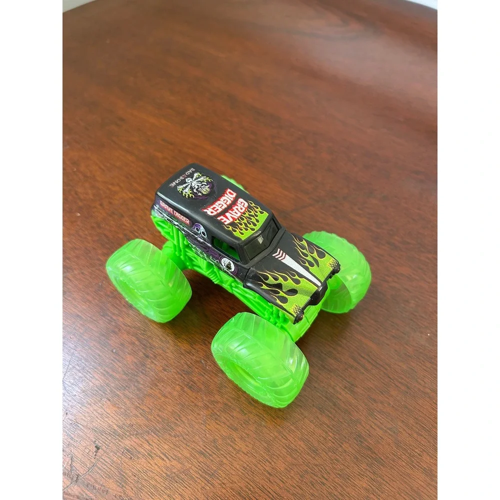 Monster Jam Grave Digger Monster Truck Black Green Flames Translucent Wheels